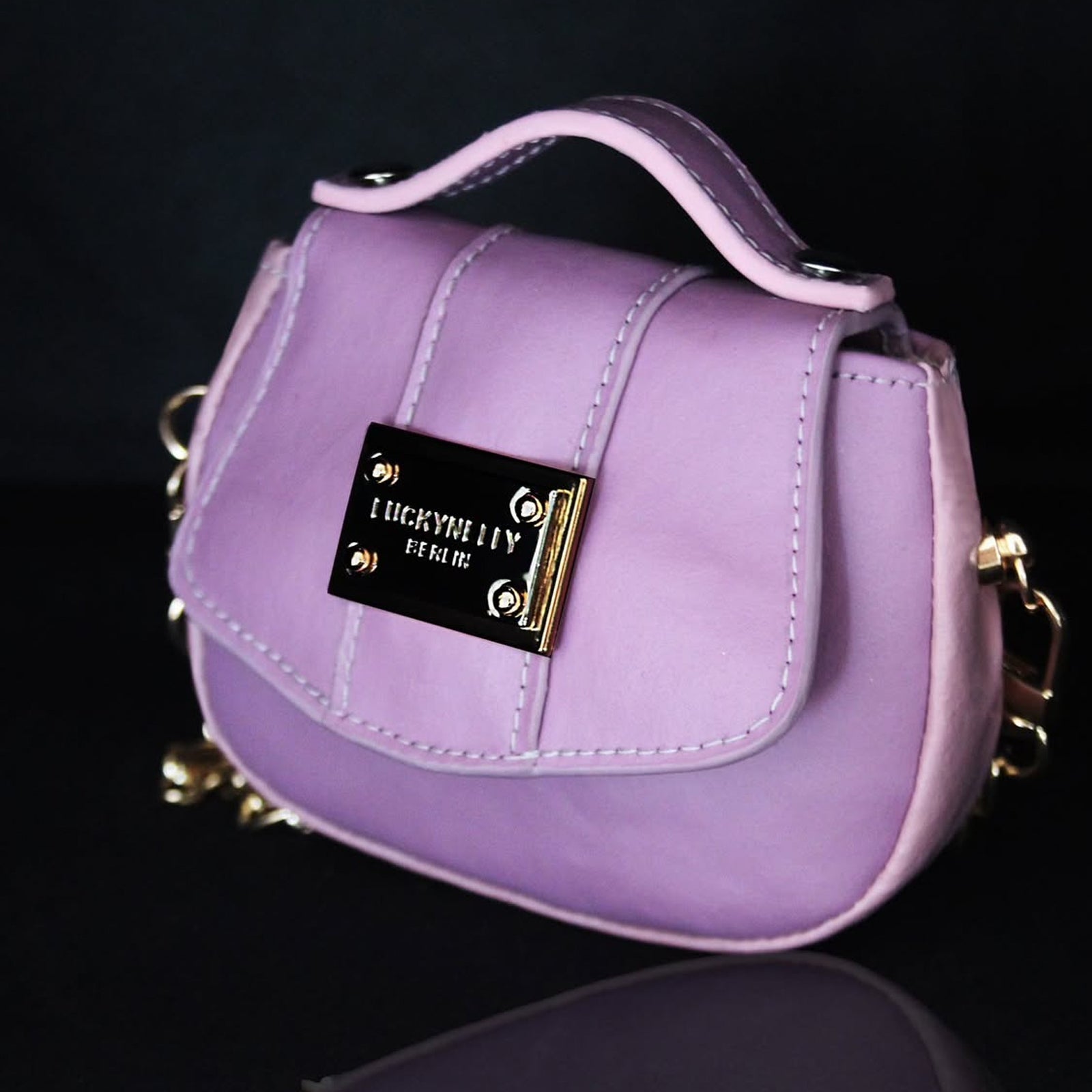 LUCKYNELLY handbag archive